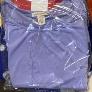 Cute lilac color. length is between mid thigh just above the knee. Super soft.